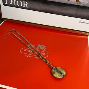 Etienne Aigner necklace.